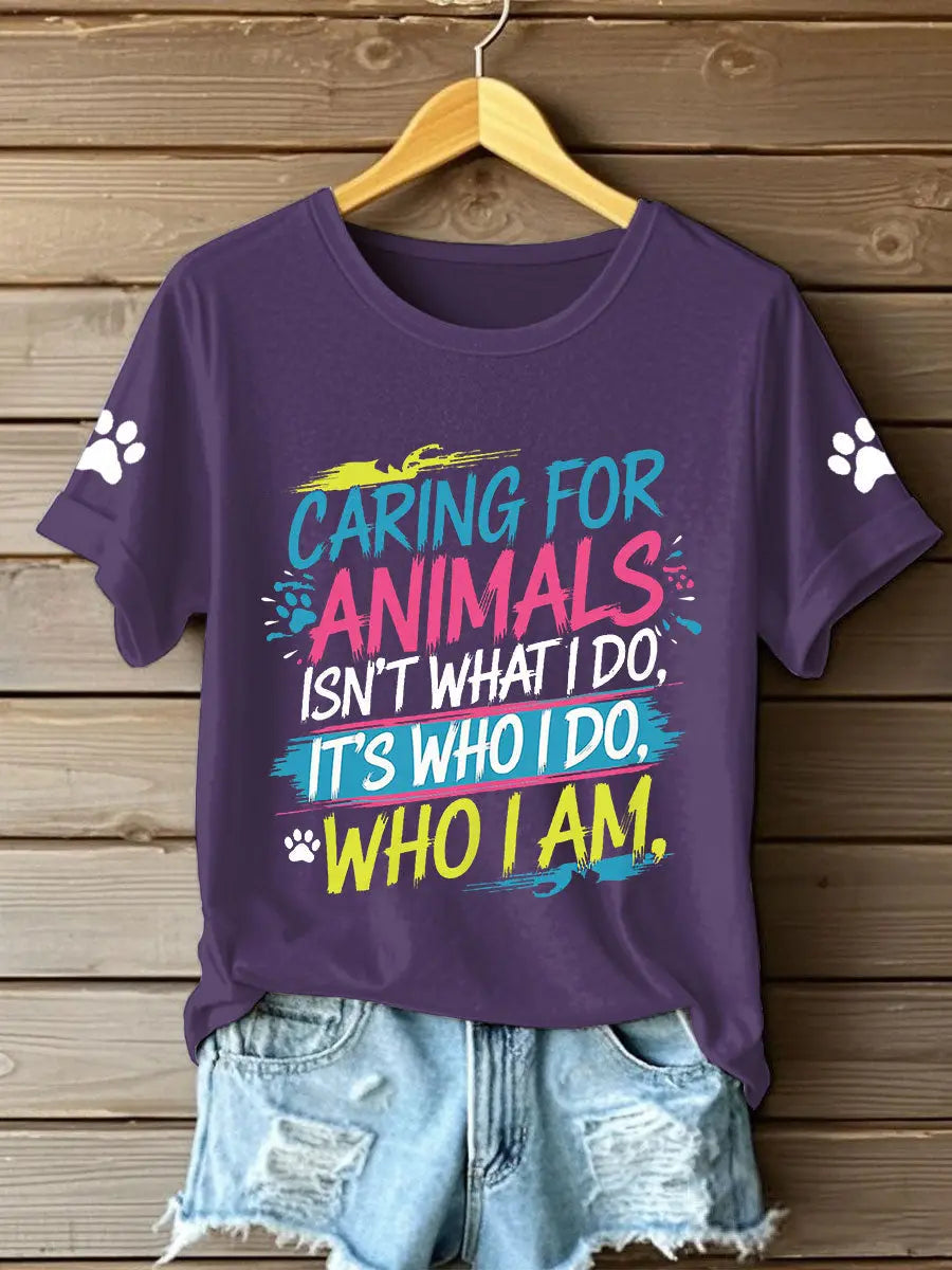 Women's caring for animals isn't what I do it's who I am T-shirts