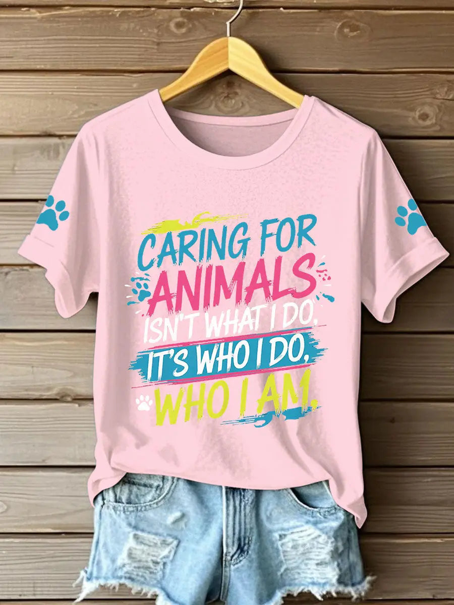 Women's caring for animals isn't what I do it's who I am T-shirts