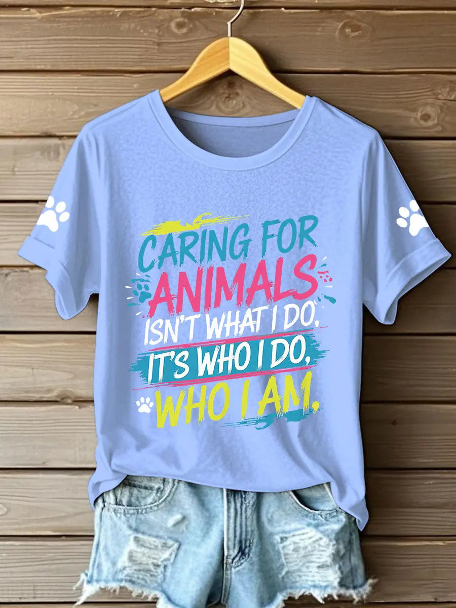 Women's caring for animals isn't what I do it's who I am T-shirts