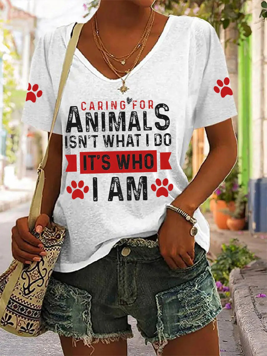 Women's caring for animals isn't what I do it's who I am V-neck T-shirts
